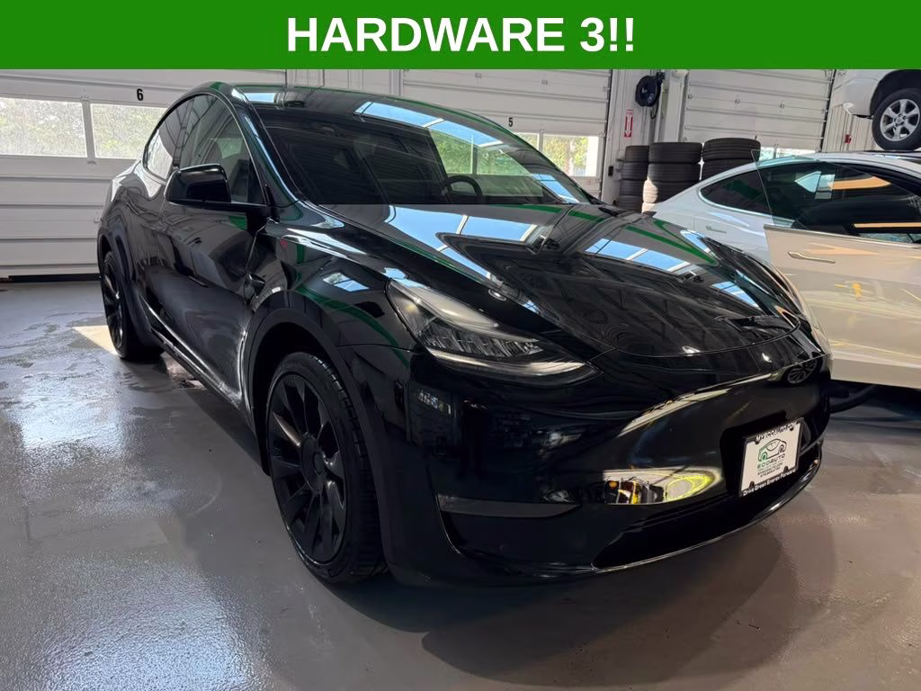 2023 Solid Black Tesla Model Y Long Range AWD SUV