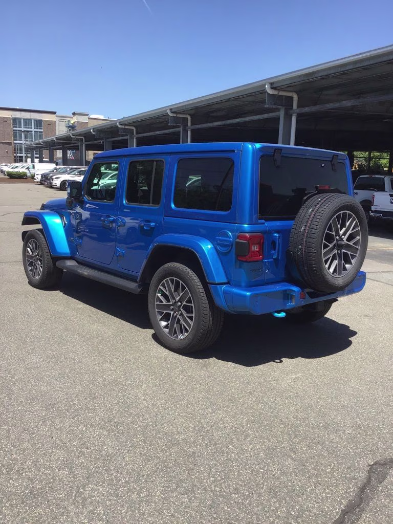 2023 Hydro Blue Pearl Coat Jeep Wrangler Sahara 4xe 4X4 SUV