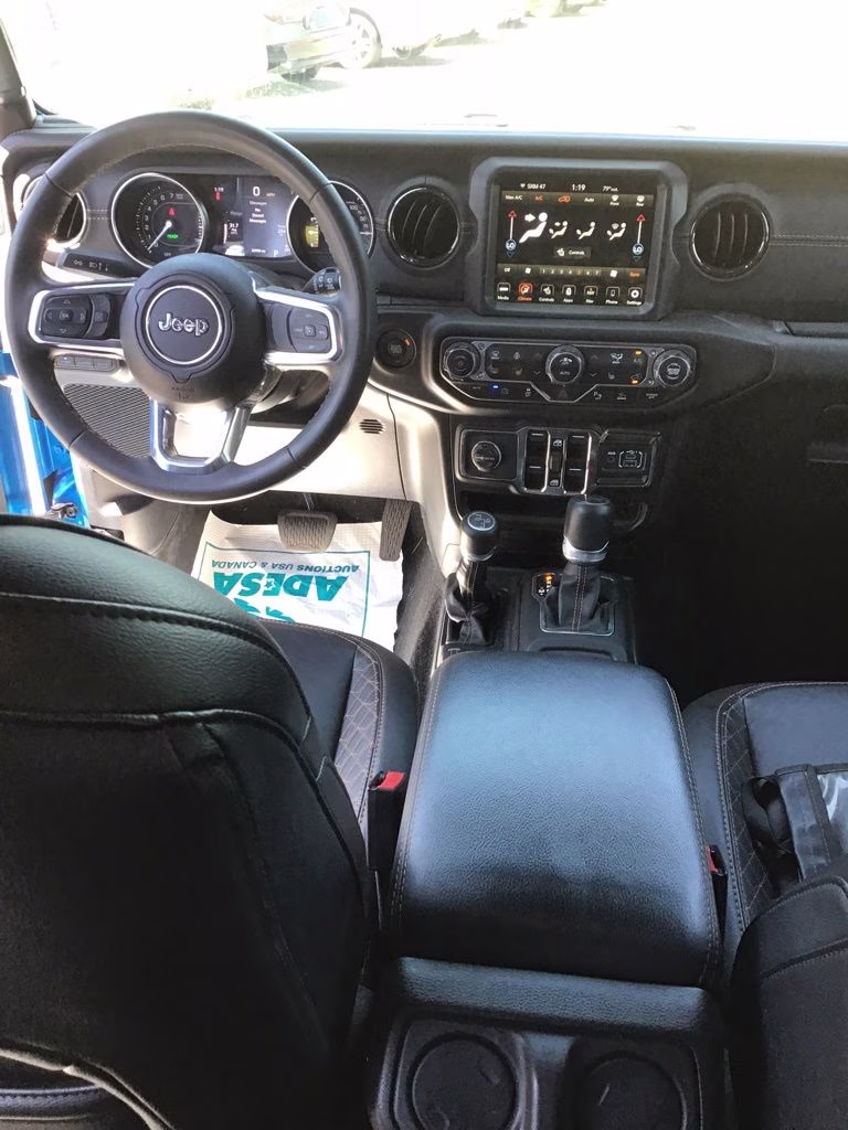 2023 Hydro Blue Pearl Coat Jeep Wrangler Sahara 4xe 4X4 SUV