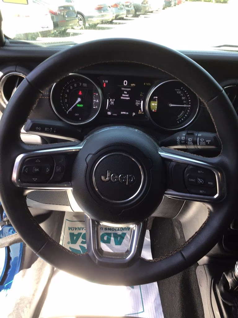 2023 Hydro Blue Pearl Coat Jeep Wrangler Sahara 4xe 4X4 SUV