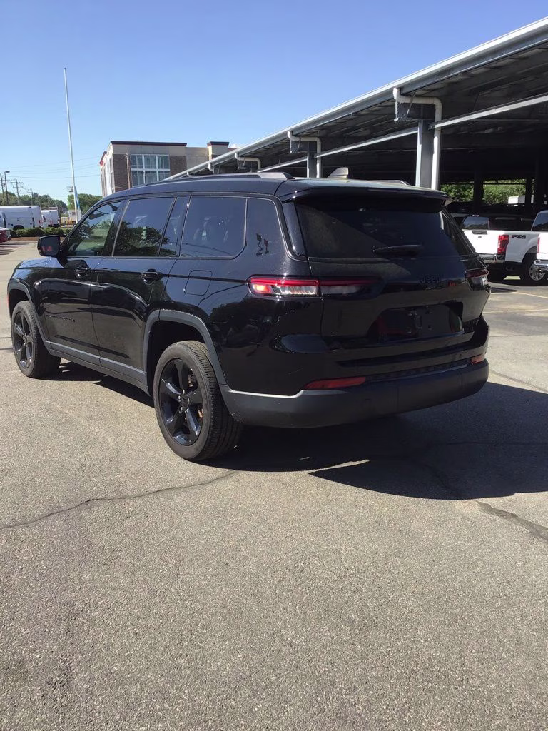 2023 Diamond Black Crystal Pearlcoat Jeep Grand Cherokee L Altitude 4X4 SUV