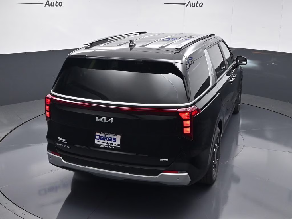 2026 Aurora Black Pearl Kia Carnival Hybrid EX FWD Van