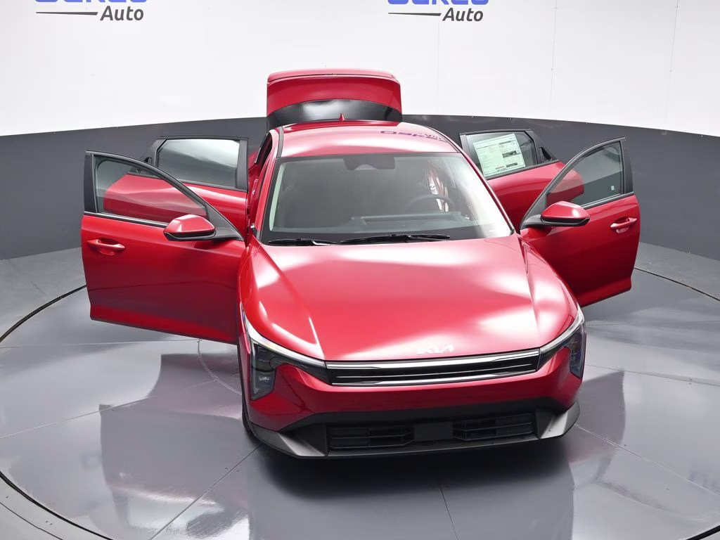 2026 Currant Red Kia K4 LXS FWD Sedan