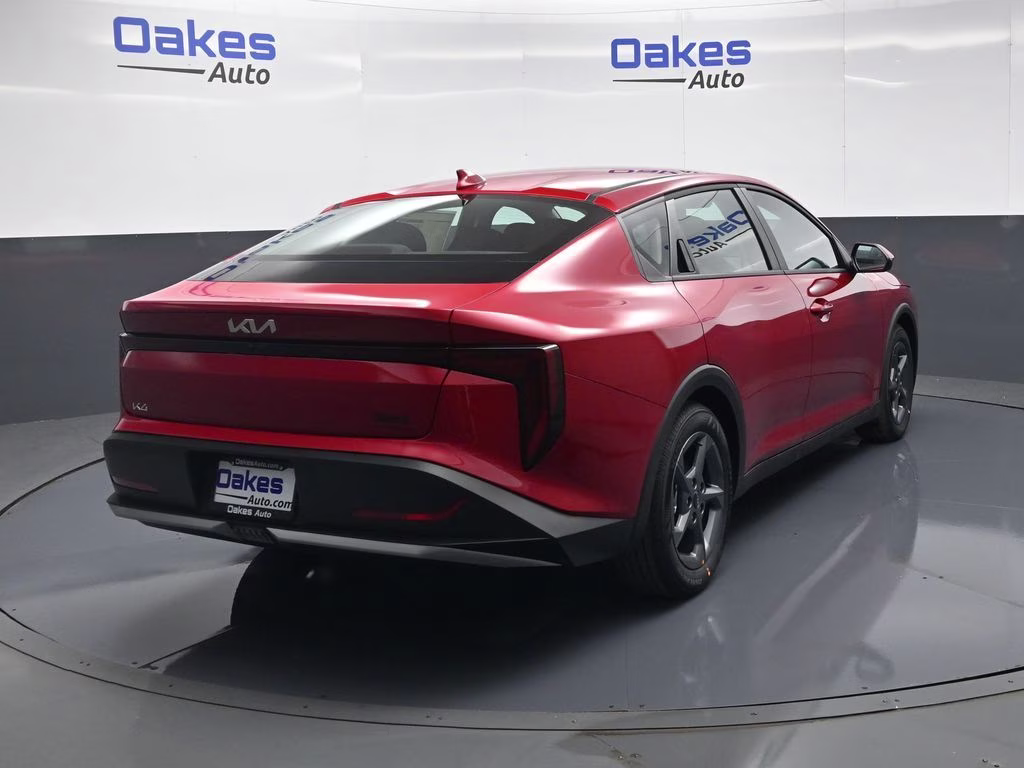 2026 Currant Red Kia K4 LXS FWD Sedan