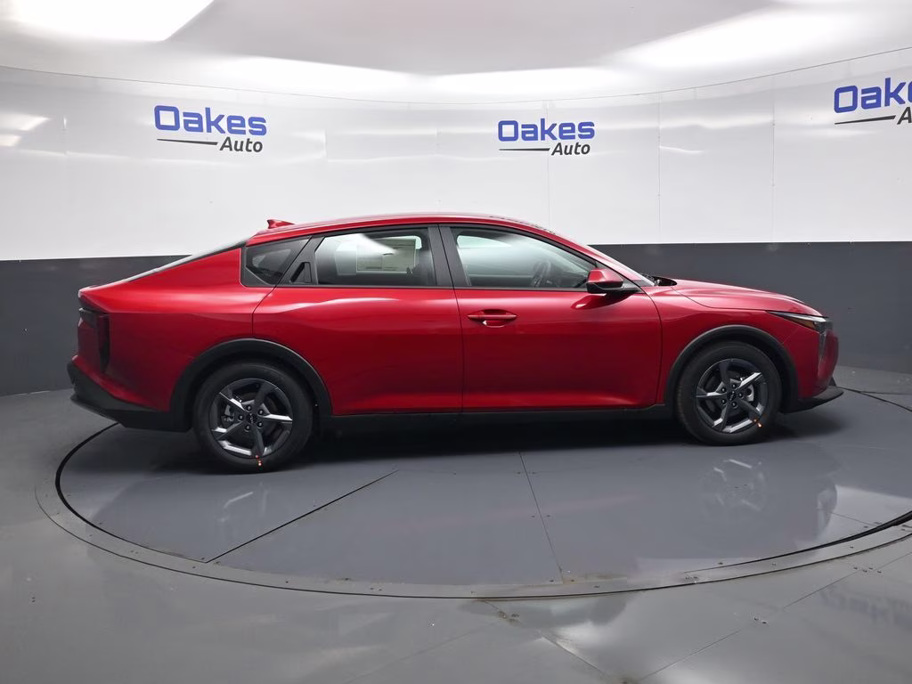 2026 Currant Red Kia K4 LXS FWD Sedan
