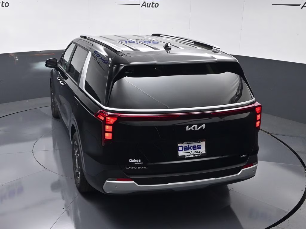 2026 Aurora Black Pearl Kia Carnival Hybrid EX FWD Van