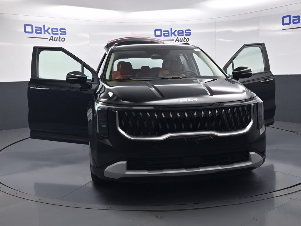 2026 Aurora Black Pearl Kia Carnival Hybrid EX FWD Van