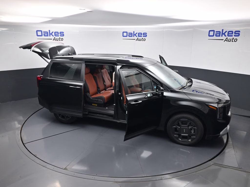2026 Aurora Black Pearl Kia Carnival Hybrid EX FWD Van