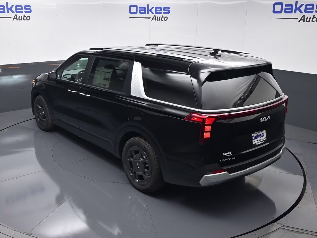 2026 Aurora Black Pearl Kia Carnival Hybrid EX FWD Van