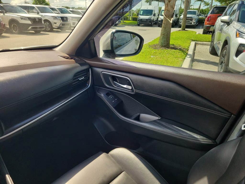 2021 Champagne Silver Metallic Nissan Rogue SL FWD SUV