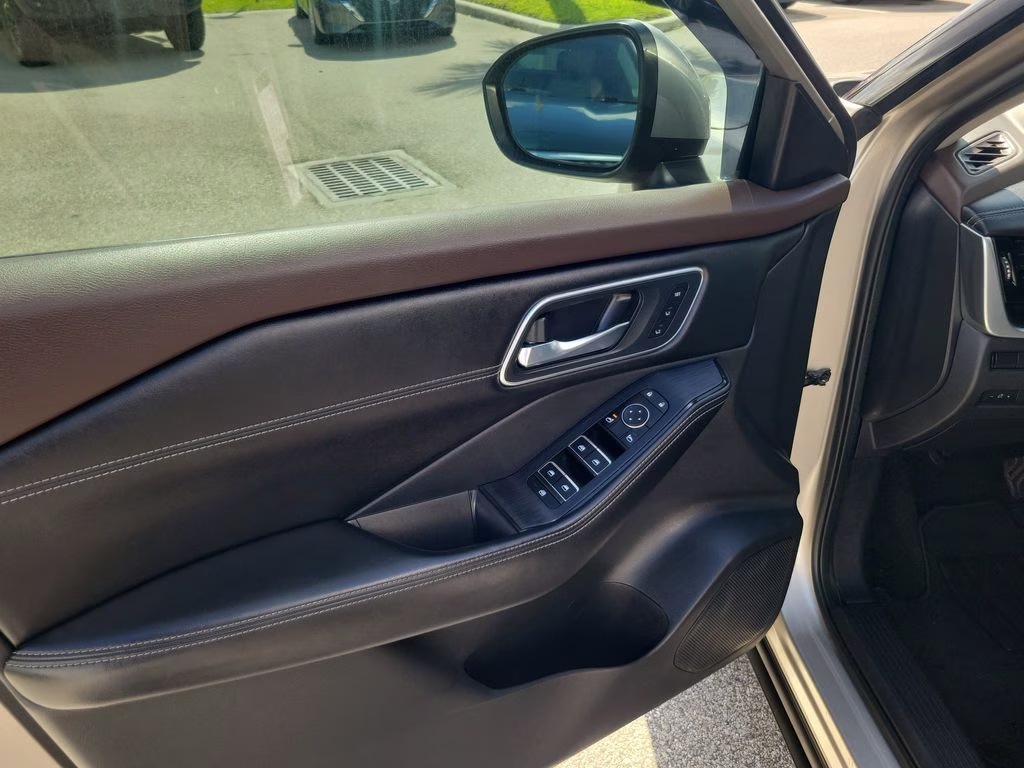 2021 Champagne Silver Metallic Nissan Rogue SL FWD SUV