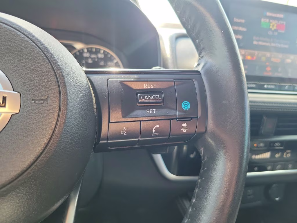 2021 Champagne Silver Metallic Nissan Rogue SL FWD SUV