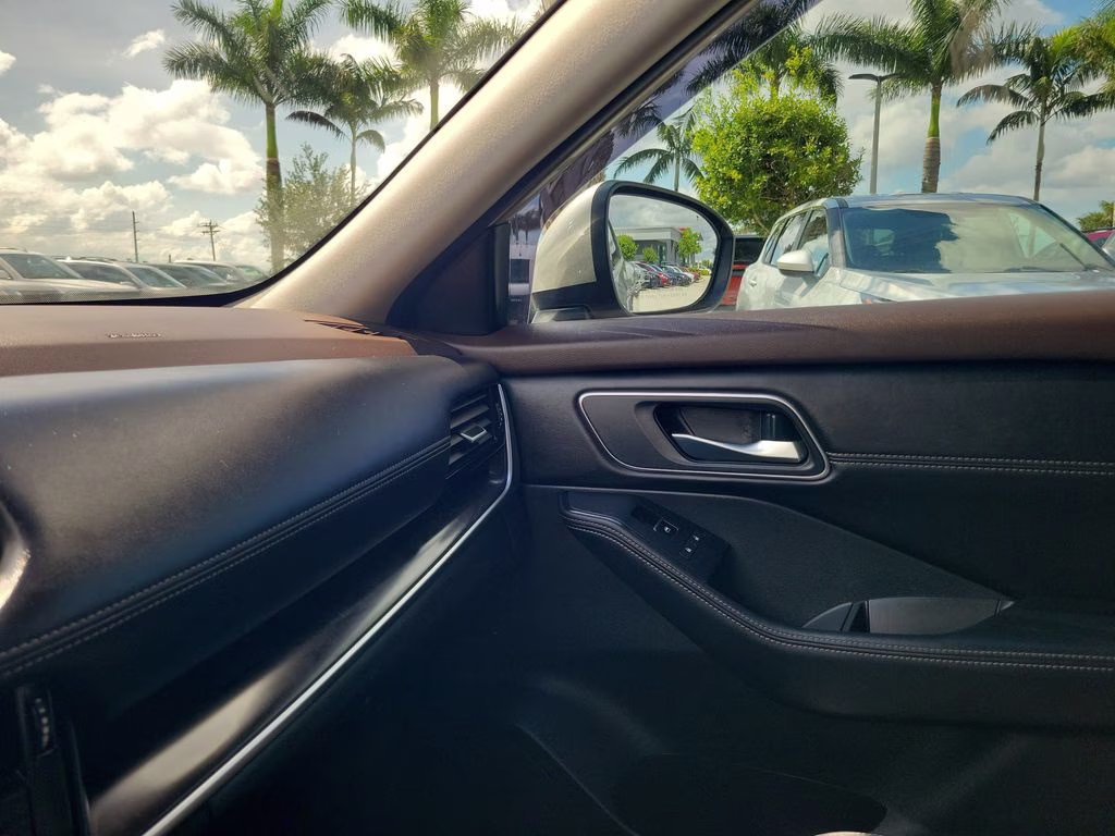 2021 Champagne Silver Metallic Nissan Rogue SL FWD SUV