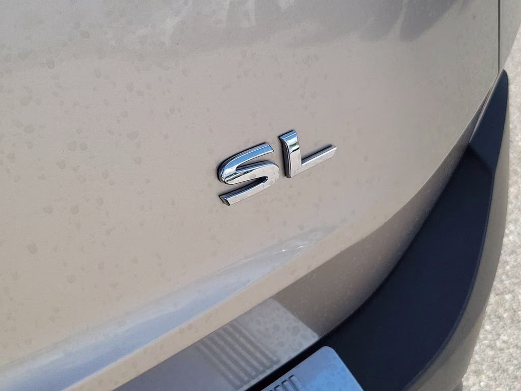 2021 Champagne Silver Metallic Nissan Rogue SL FWD SUV