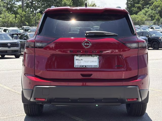 2026 Scarlet Ember Tintcoat Nissan Rogue Dark Armor AWD SUV