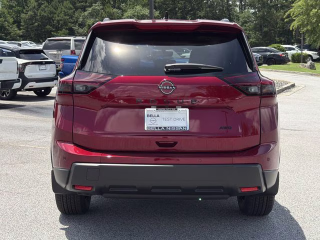 2026 Scarlet Ember Tintcoat Nissan Rogue Dark Armor AWD SUV