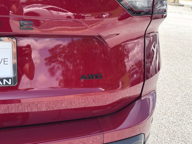 2026 Scarlet Ember Tintcoat Nissan Rogue Dark Armor AWD SUV