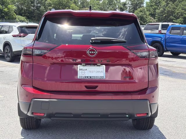 2026 Scarlet Ember Tintcoat Nissan Rogue Dark Armor AWD SUV