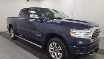 2023 Patriot Blue Pearlcoat Ram 1500 Laramie Longhorn 4X4 Truck