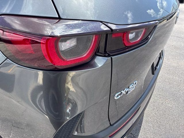 2025 Machine Gray Metallic Mazda CX-50 Hybrid Premium AWD SUV
