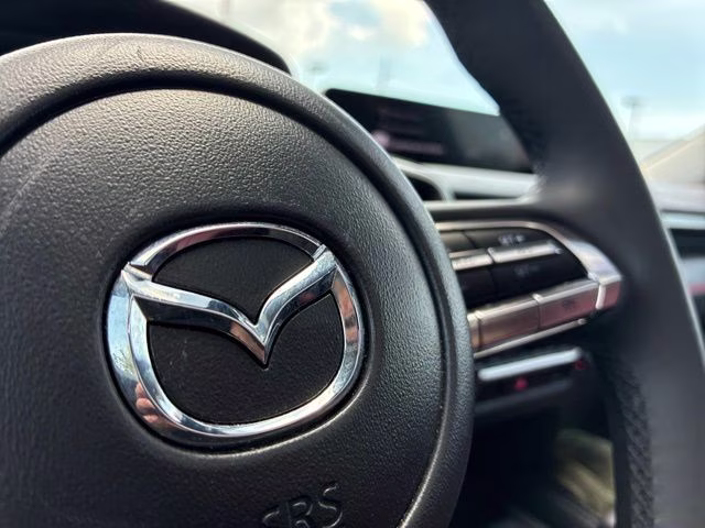 2025 Machine Gray Metallic Mazda CX-50 Hybrid Premium AWD SUV