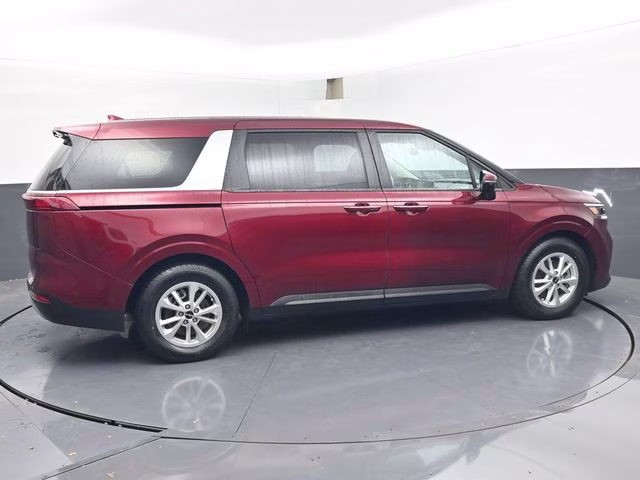 2024 Flare Red Kia Carnival LX FWD Van