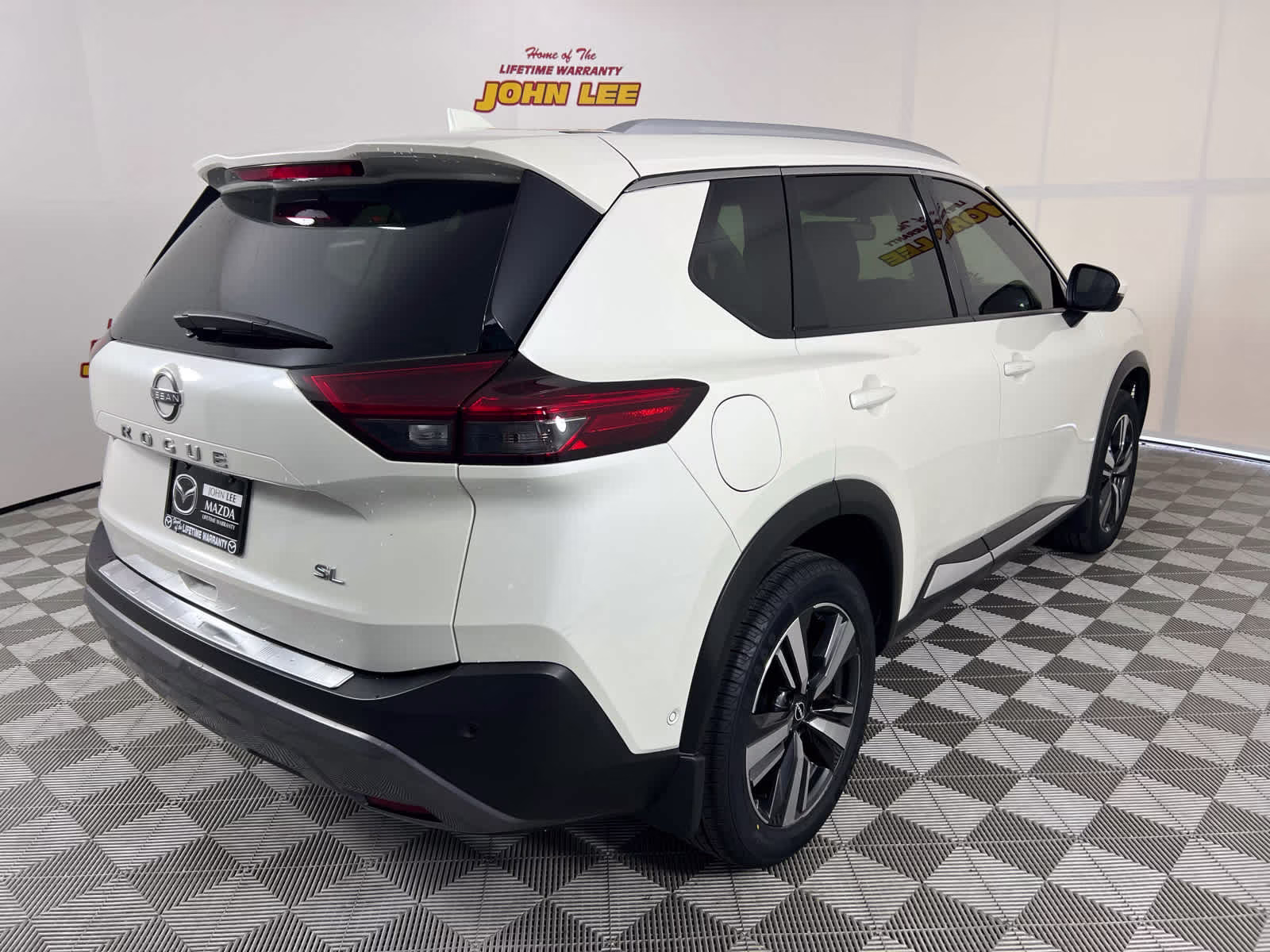 2023 Pearl White Tricoat Nissan Rogue SL FWD SUV