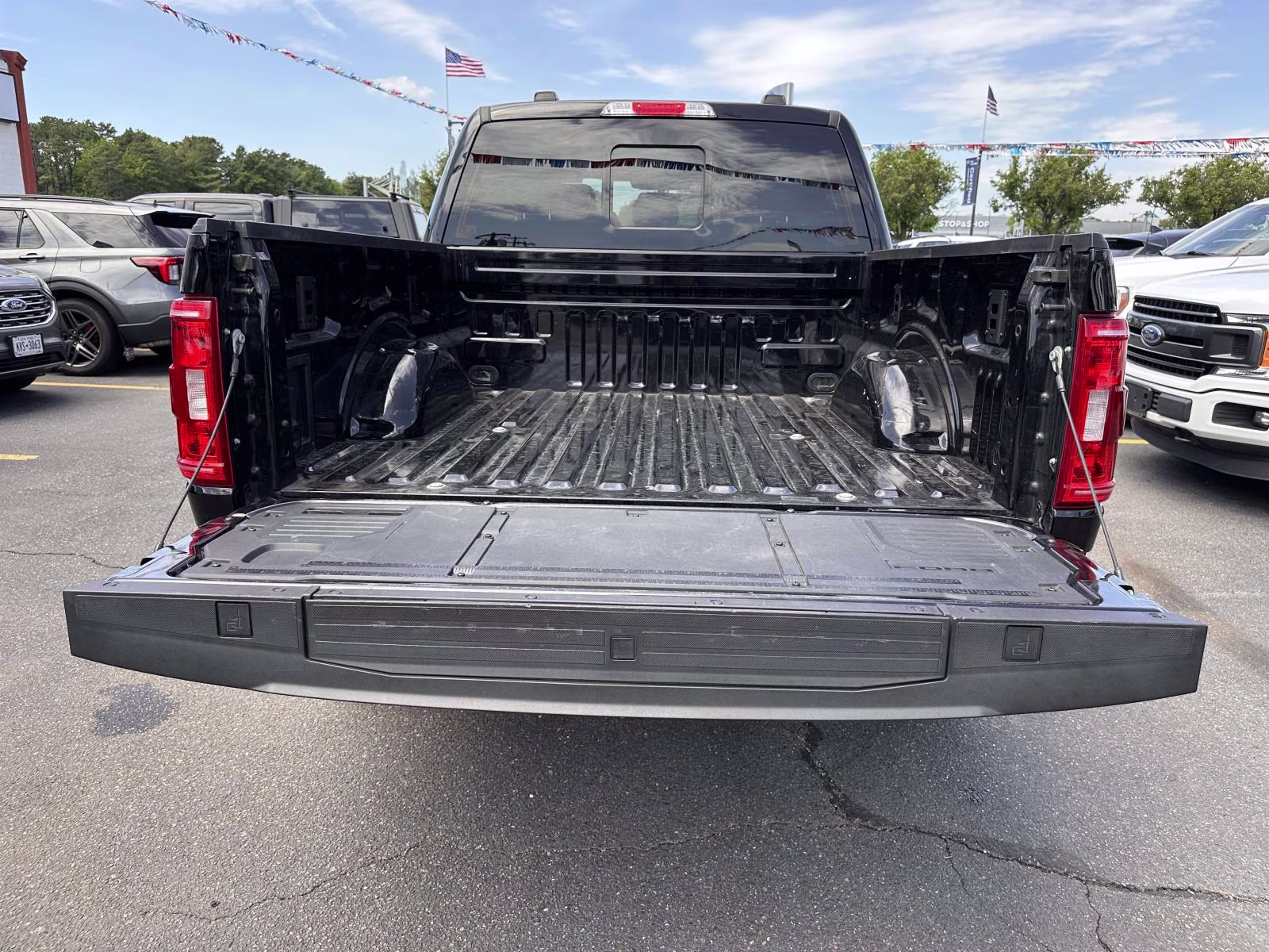 2023 Agate Black Metallic Ford F-150 XLT 4WD SuperCrew 5.5' Box 4X4 Truck