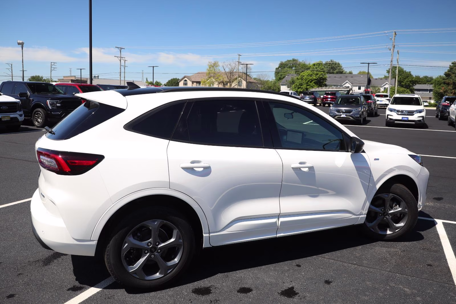2024 Star White Metallic Tri-Coat Ford Escape ST-Line AWD SUV