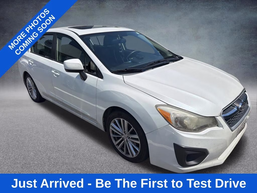 2014 Satin White Pearl Subaru Impreza 2.0i Premium AWD Sedan