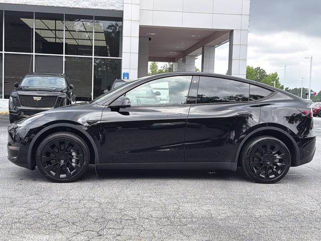 Used 2023 Tesla Model Y Long Range with VIN 7SAYGDEE2PA126768 for sale in Union City, GA