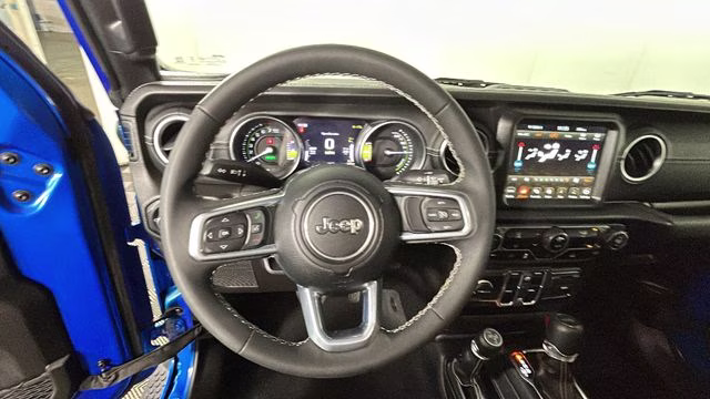 2023 Hydro Blue Pearl Coat Jeep Wrangler Sahara 4xe 4X4 SUV