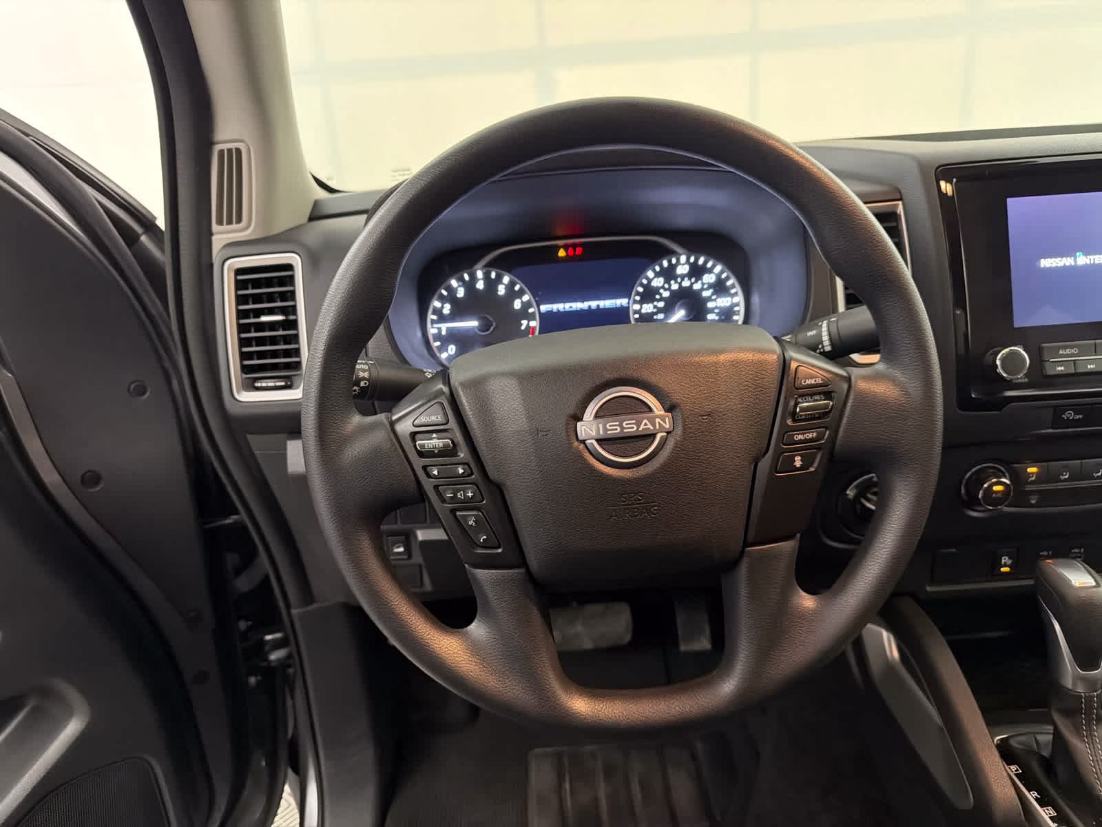 2024 Gun Metallic Nissan Frontier SV 4X4 Truck