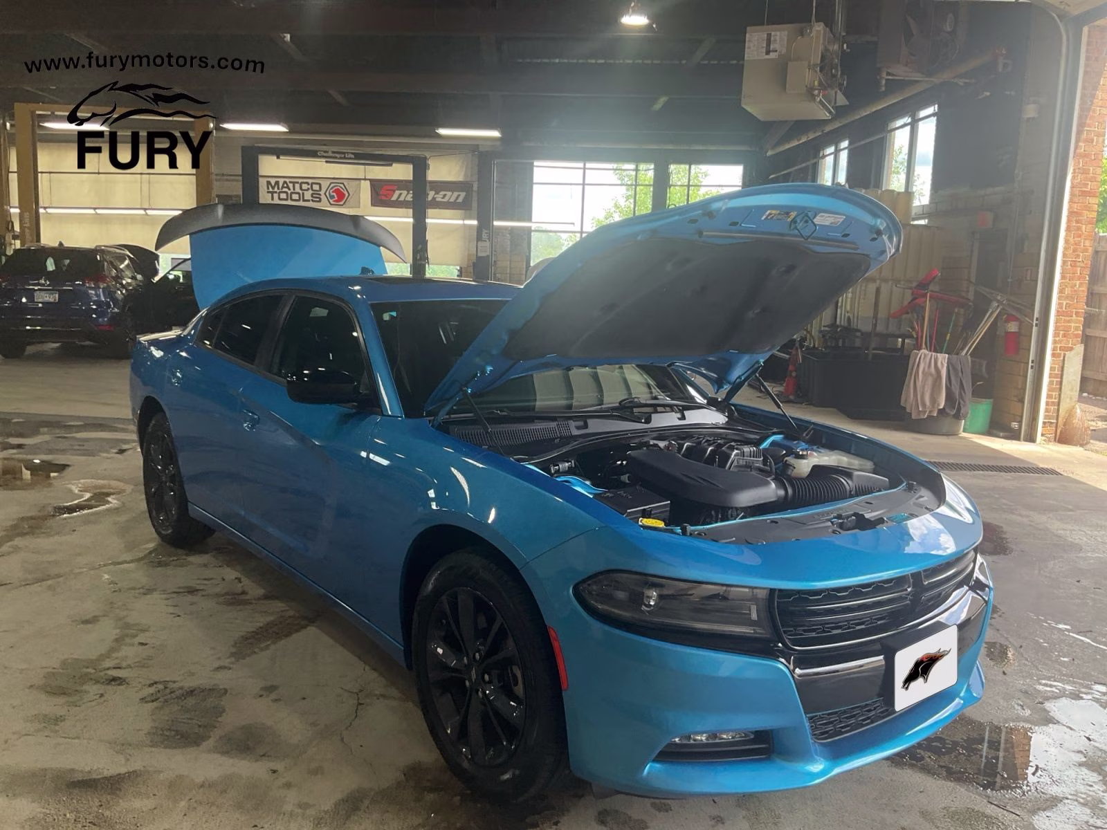 2023 B5 Blue Pearlcoat Dodge Charger SXT AWD Sedan