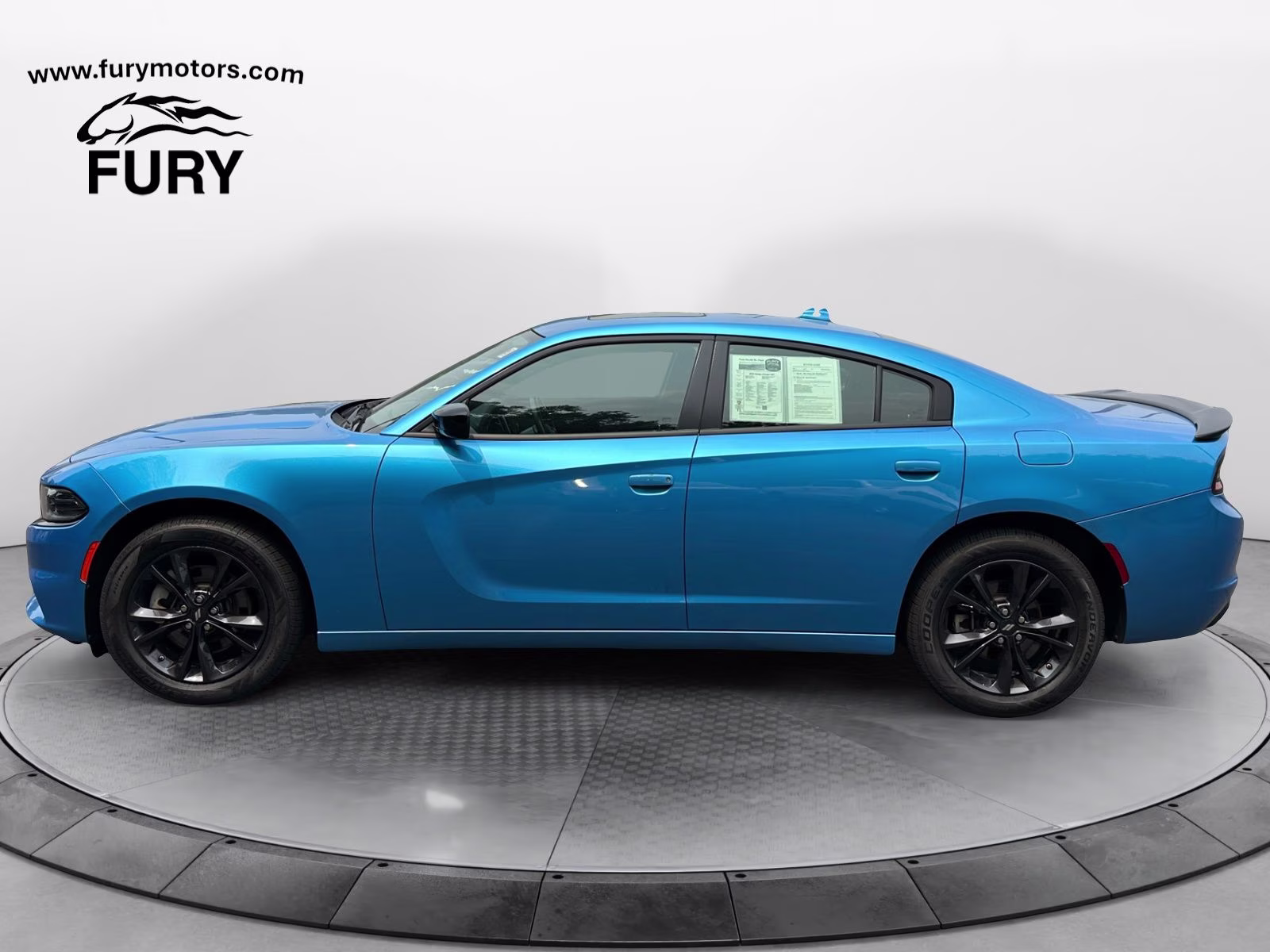 2023 B5 Blue Pearlcoat Dodge Charger SXT AWD Sedan