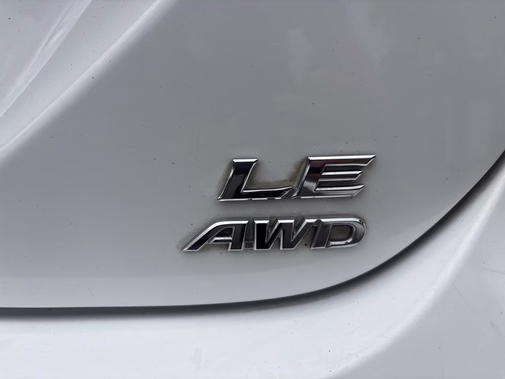 2022 White Toyota Camry LE AWD Sedan
