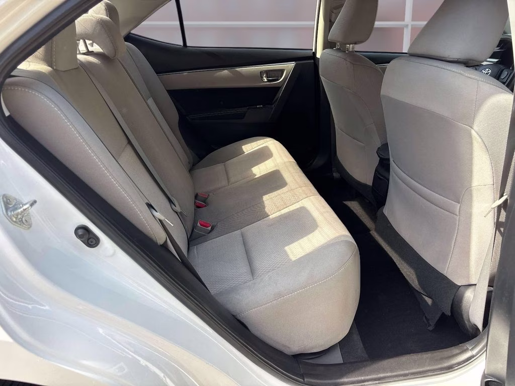 2014 Super White Toyota Corolla LE FWD Sedan