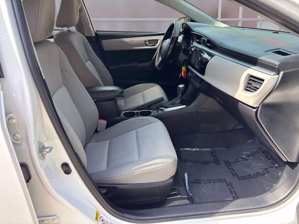 2014 Super White Toyota Corolla LE FWD Sedan