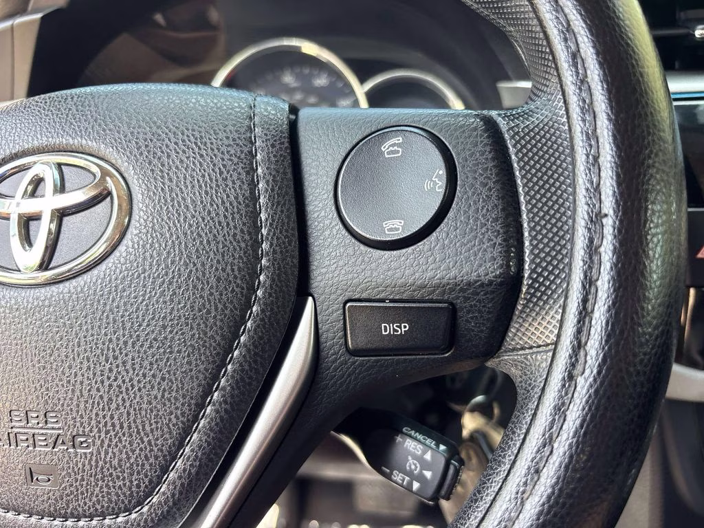 2014 Super White Toyota Corolla LE FWD Sedan