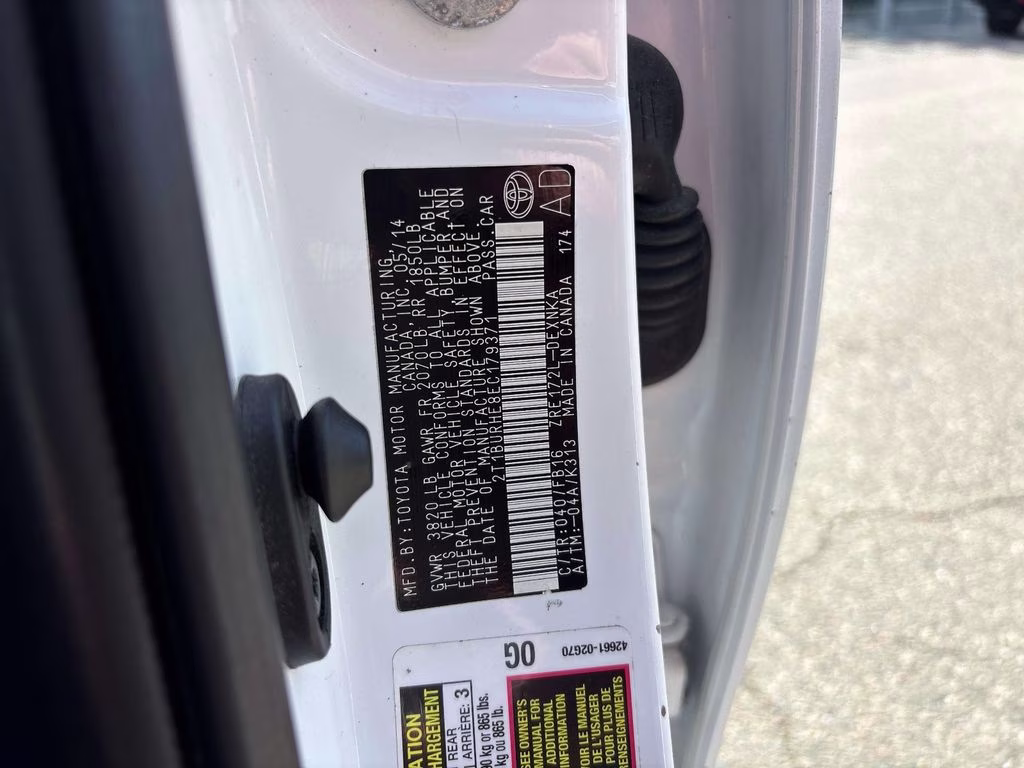 2014 Super White Toyota Corolla LE FWD Sedan