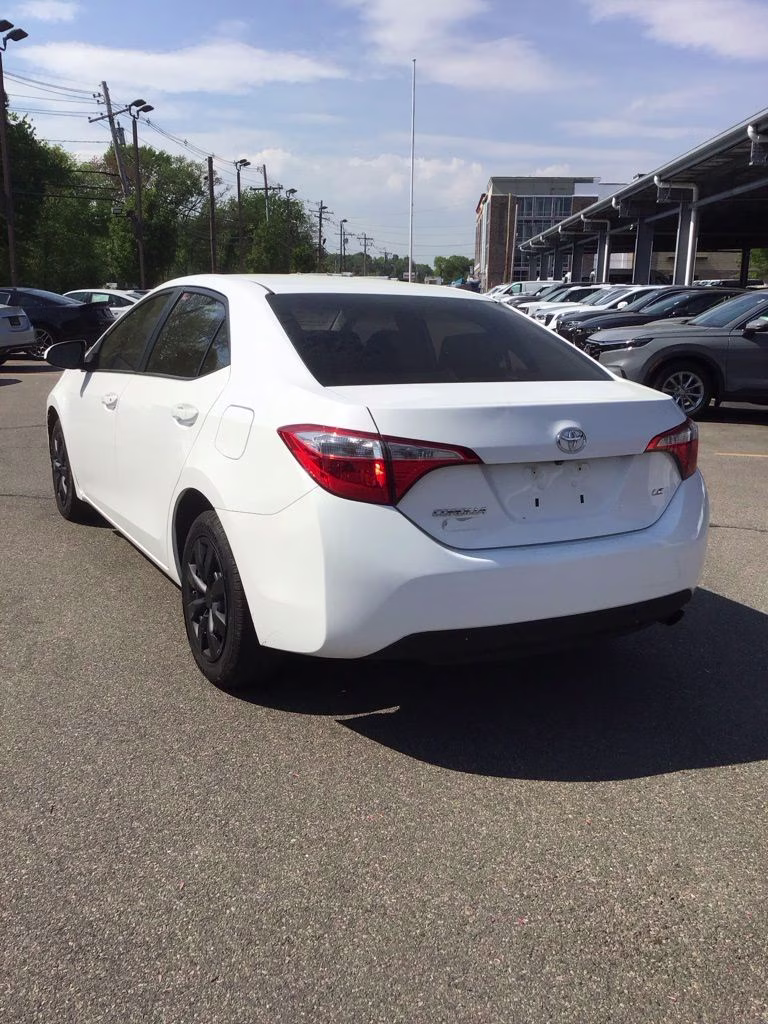 2014 Super White Toyota Corolla LE FWD Sedan