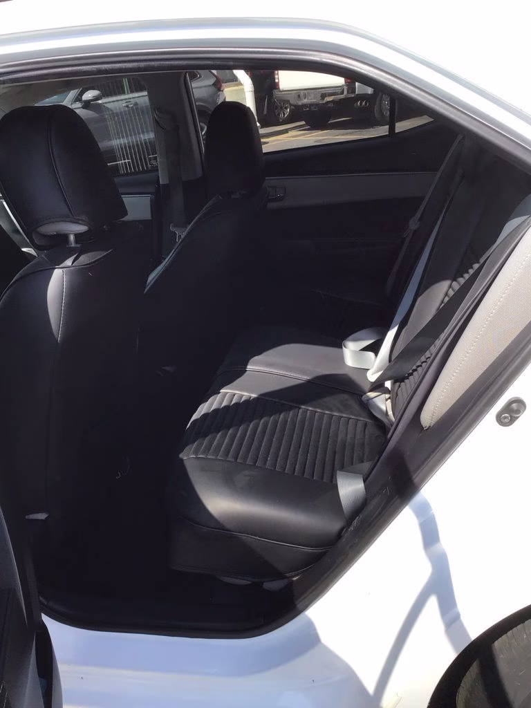 2014 Super White Toyota Corolla LE FWD Sedan
