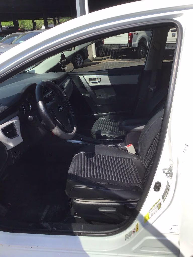 2014 Super White Toyota Corolla LE FWD Sedan