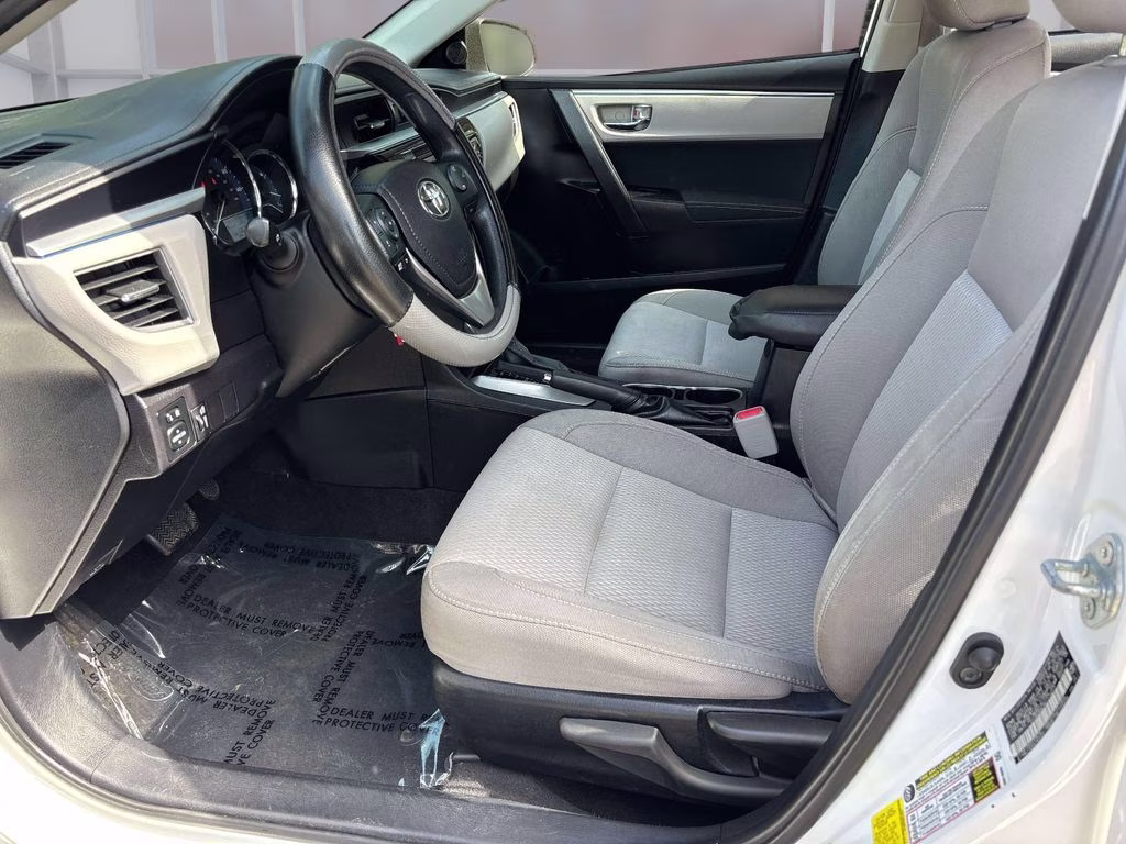 2014 Super White Toyota Corolla LE FWD Sedan