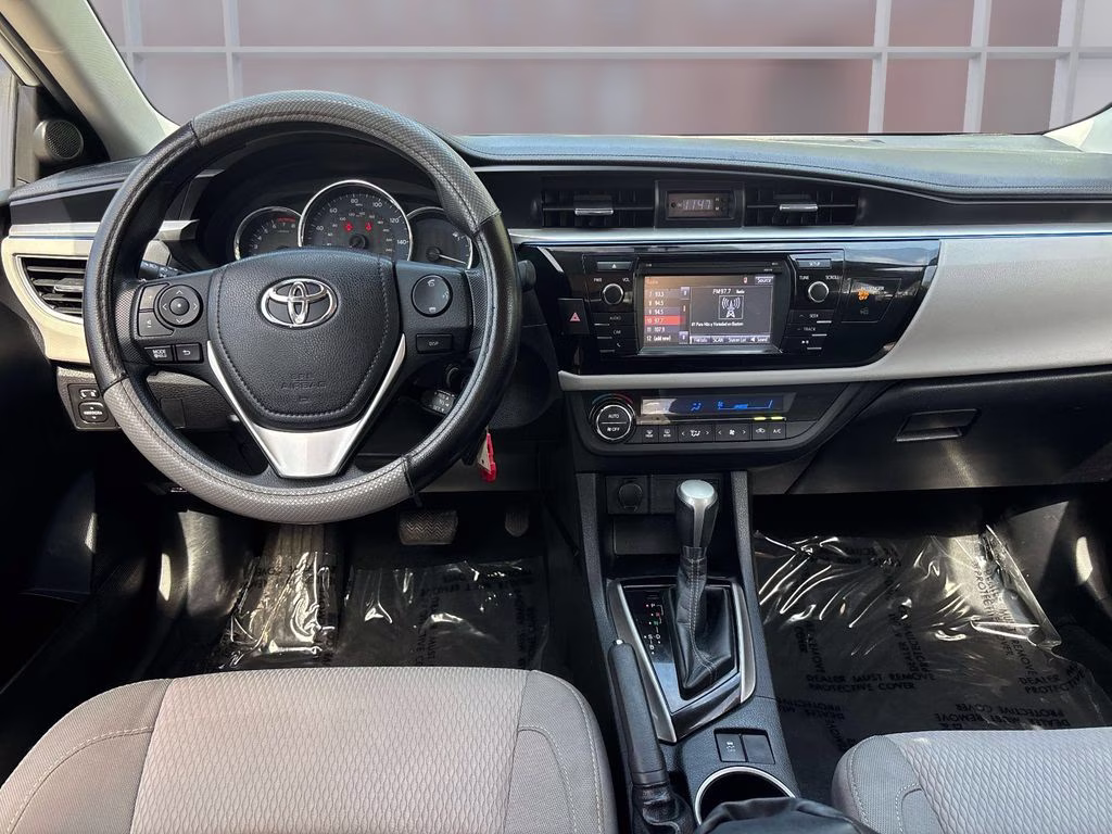 2014 Super White Toyota Corolla LE FWD Sedan