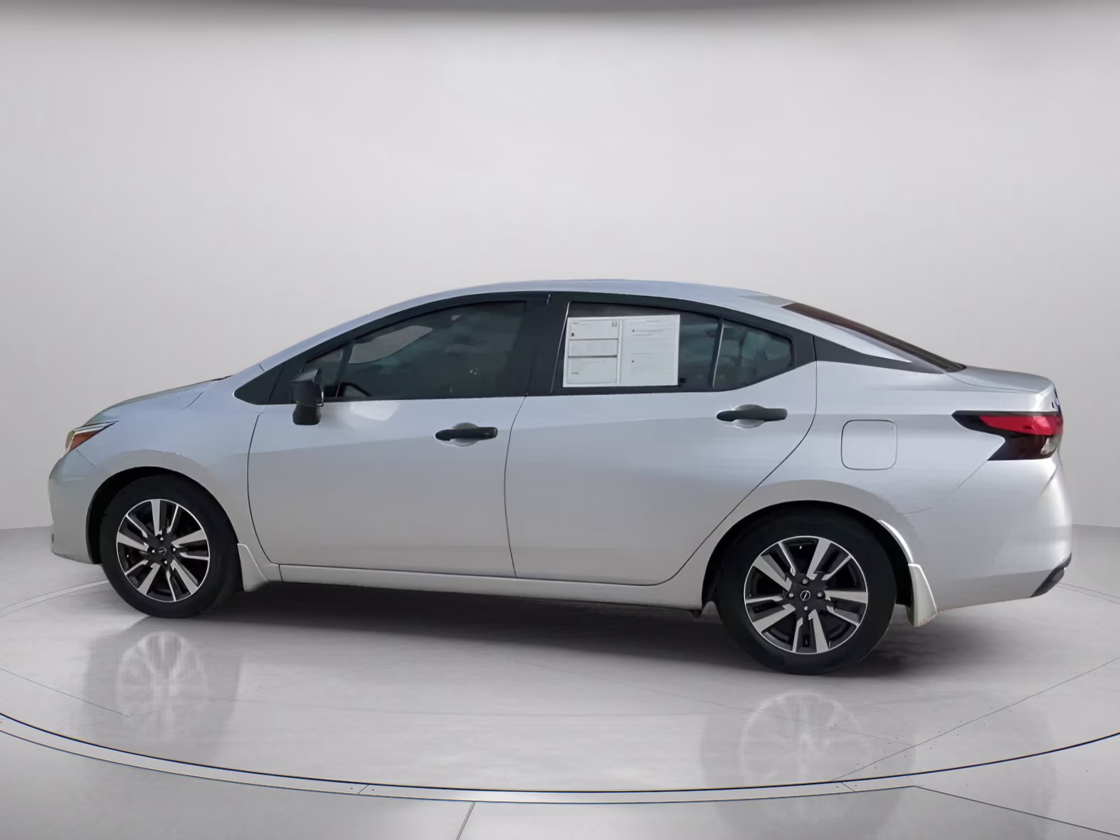 2024 Brilliant Silver Metallic Nissan Versa S FWD Sedan