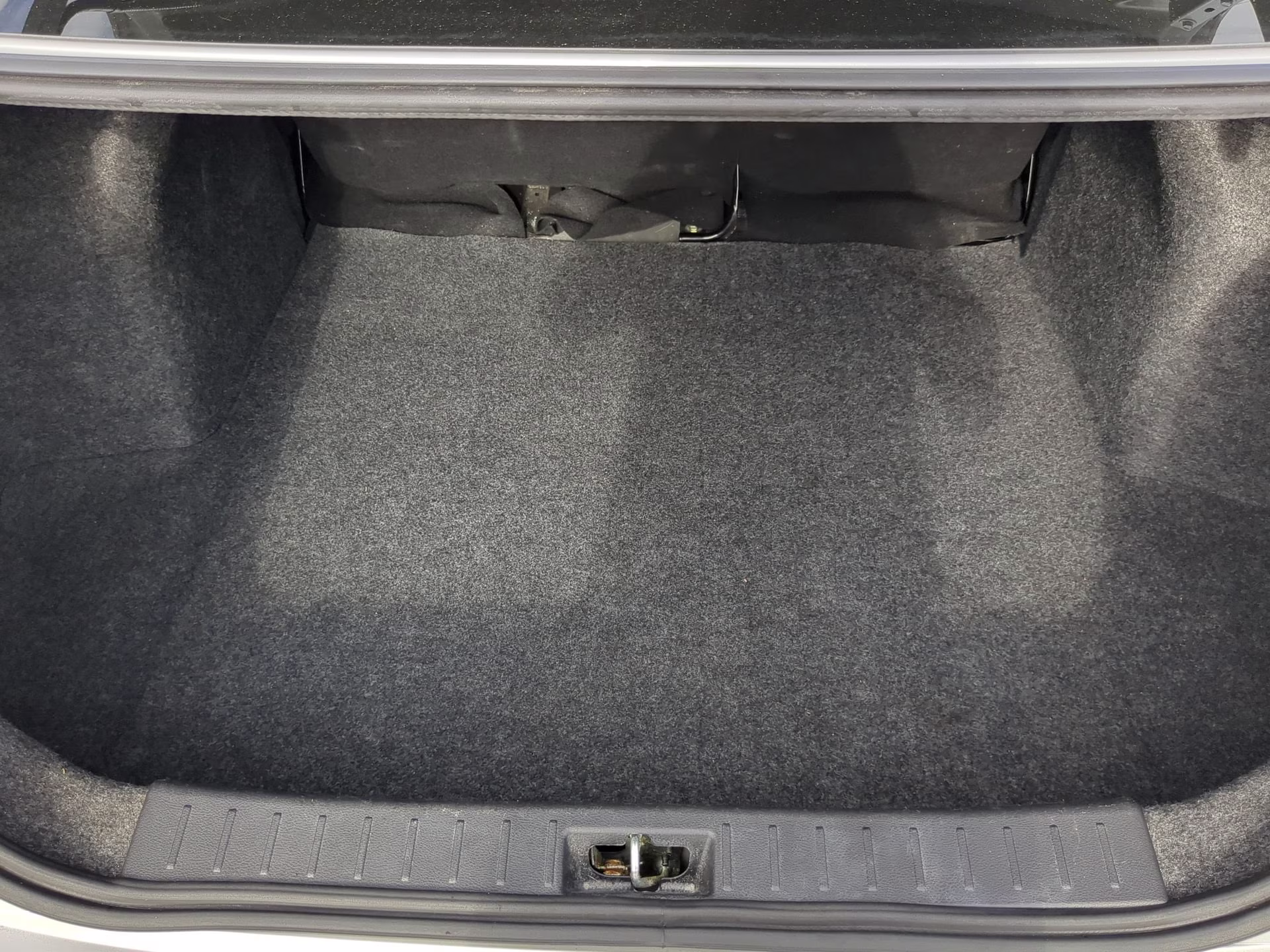 2024 Brilliant Silver Metallic Nissan Versa S FWD Sedan