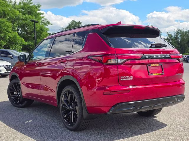 2026 Royal Red Nissan Rogue Plug-In Hybrid Platinum AWD SUV