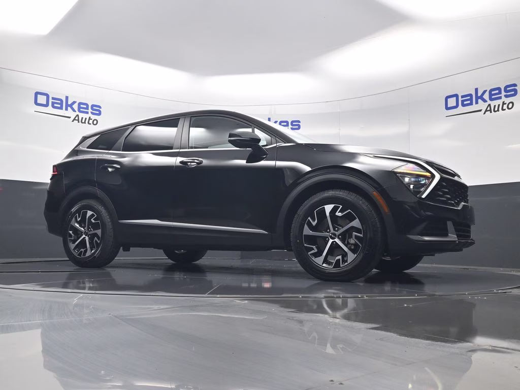 2024 Ebony Black Kia Sportage EX FWD SUV