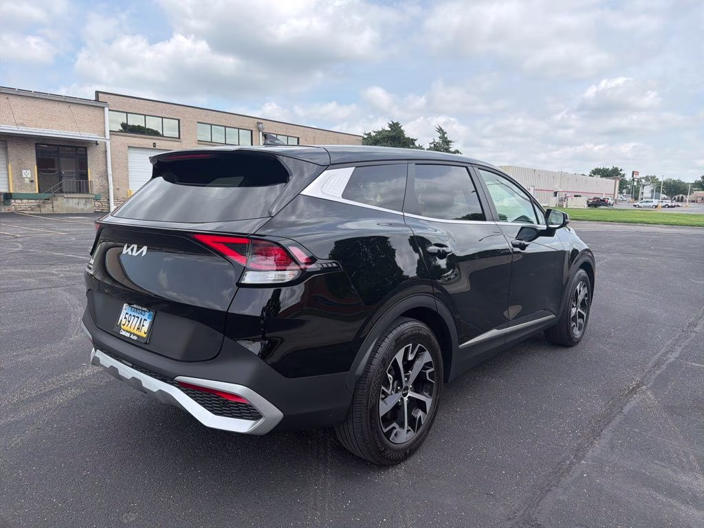 2024 Ebony Black Kia Sportage EX FWD SUV